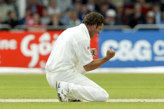 New Zealand's Chris Cairns celebrates trapping England's Michael Vaughan lbw 