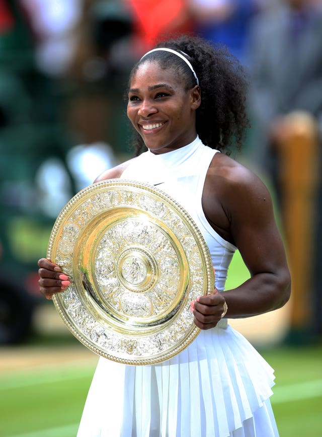 Serena Williams holds the Venus Rosewater Dish for the final time in 2016
