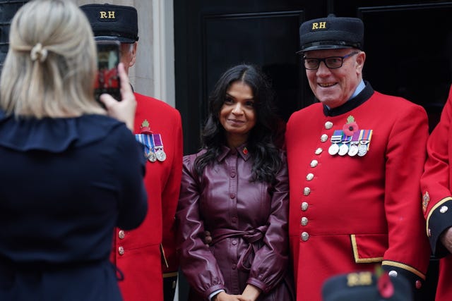 Akshata Murty with Chelsea Pensioners in Downing Street