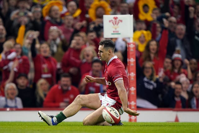 Wales scrum-half Tomos Williams slides in for a try in his side's 20-13 win against Argentina in Cardiff 