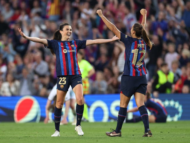 Barcelona’s Ingrid Syrstad Engen (left) and Patricia Guijarro celebrate reaching the Champions League final 