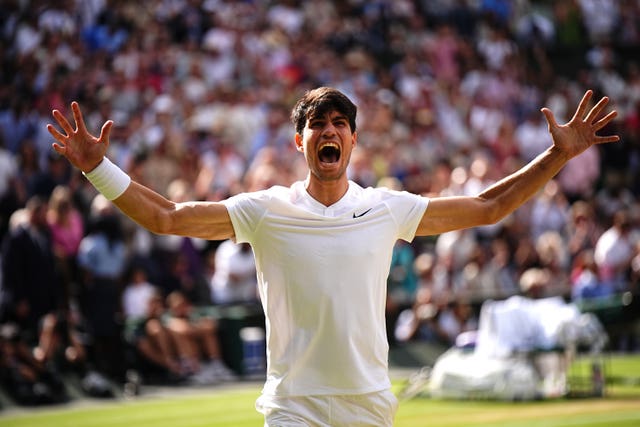 Carlos Alcaraz celebrating his Wimbledon title