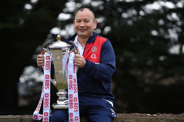 Eddie Jones holds the Six Nations trophy