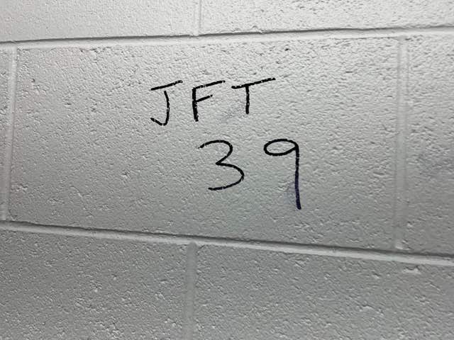 Graffiti in the concourse of the away end at Anfield references the Hillsborough and Heysel disasters