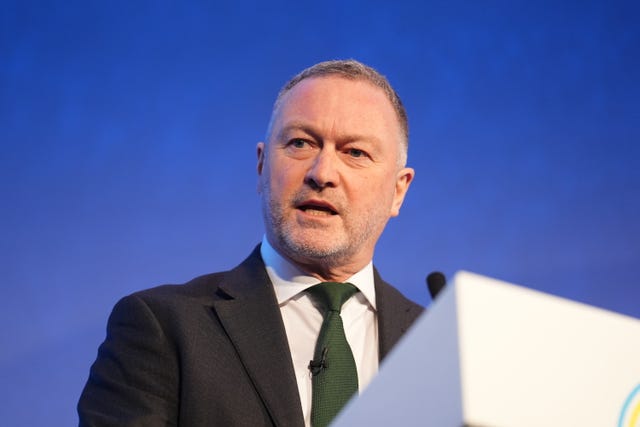 Steve Reed speaking at a lectern