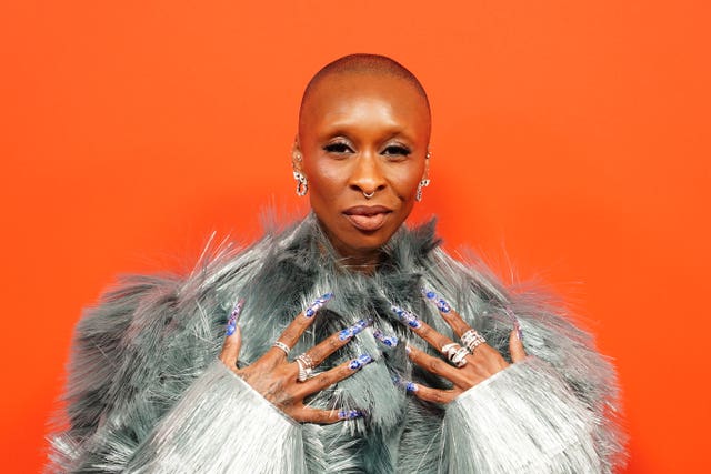 Cynthia Erivo posing for photos at a red carpet event