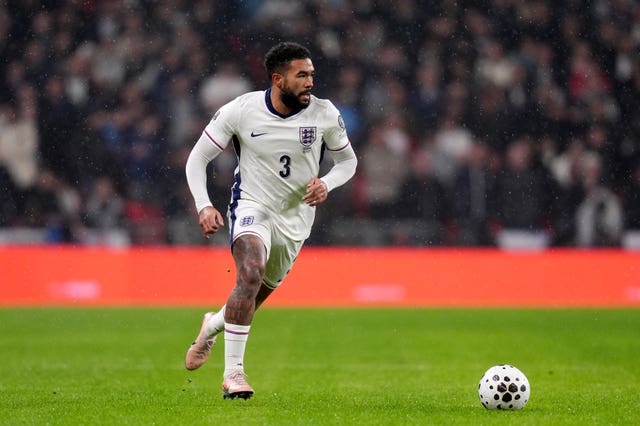 Reece James runs with the ball for England.