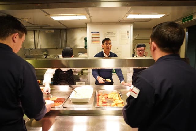 Rishi Sunak was behind the hot food counter as breakfast was served 