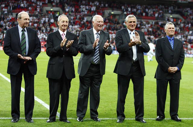 Jimmy Armfield, left, lines up to receive his 1966 World Cup winners medal alongside Gerry Byrne, Ron Flowers, Norman Hunter and Terry Paine 
