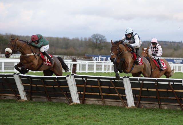 Fiercely Proud  jumps the last upsides Kabral Du Mathan (right) 