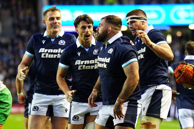 Scotland’s Jamie Bhatti (second right) celebrates scoring their side’s sixth try of the game