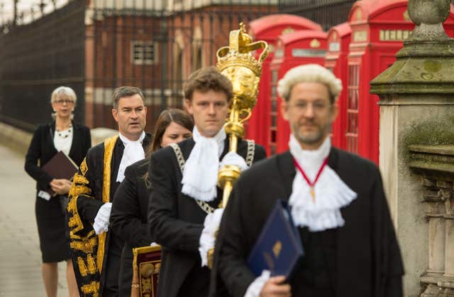 Lord Chancellor David Gauke (second left) arrives for his swearing in ceremony at the Royal Courts of Justice, in London (Dominic Lipinski/PA)