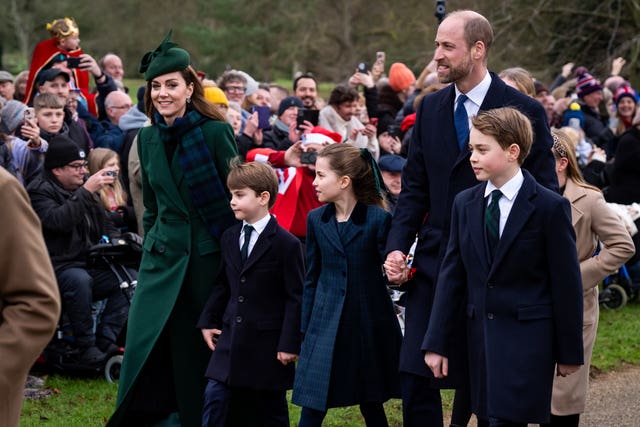 The Waleses walking past crowds of wellwishers as they attend the morning church service in Sandringham on Christmas Day 