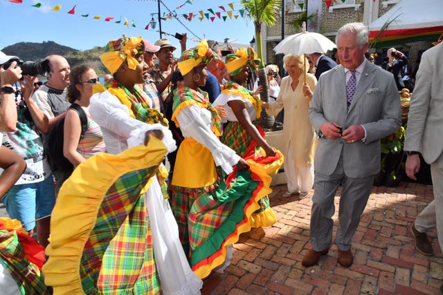 The Prince of Wales and the Duchess of Cornwall during their tour of Grenada (Arthur Edwards/The Sun/PA)