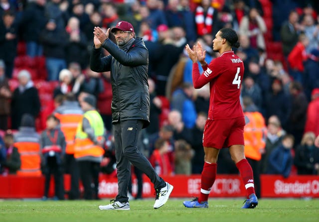 Jurgen Klopp, left, defended Virgil van Dijk after the Dutchman came in for criticism following his display in Belgrade (Dave Thompson/PA)