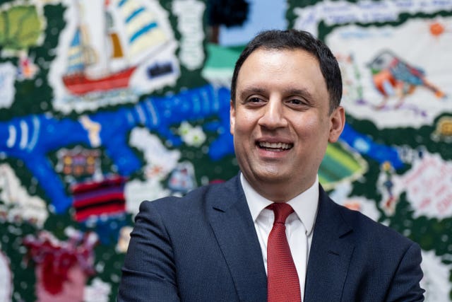 Anas Sarwar smiles during a visit to a health innovation hub