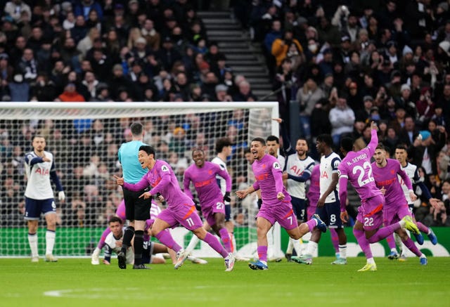 Hwang Hee-Chan (second left) celebrates scoring their side’s first goal