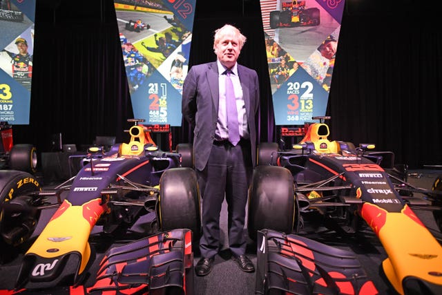 Boris Johnson with F1 cars