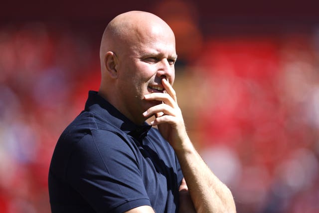 Liverpool head coach Arne Slot puts his hand to his mouth