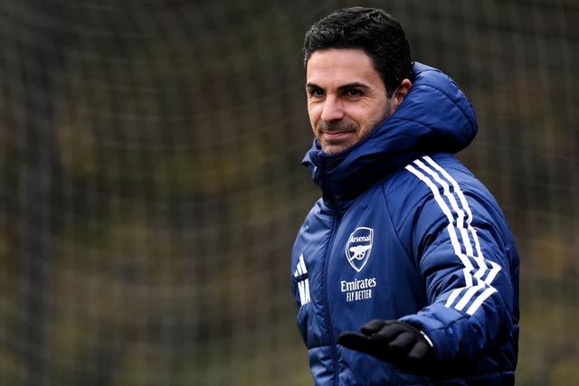Mikel Arteta smiles