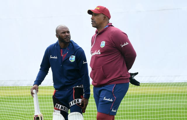 Blackwood, left, takes heart from the support of West Indies coach Phil Simmons (Gareth Copley/PA)