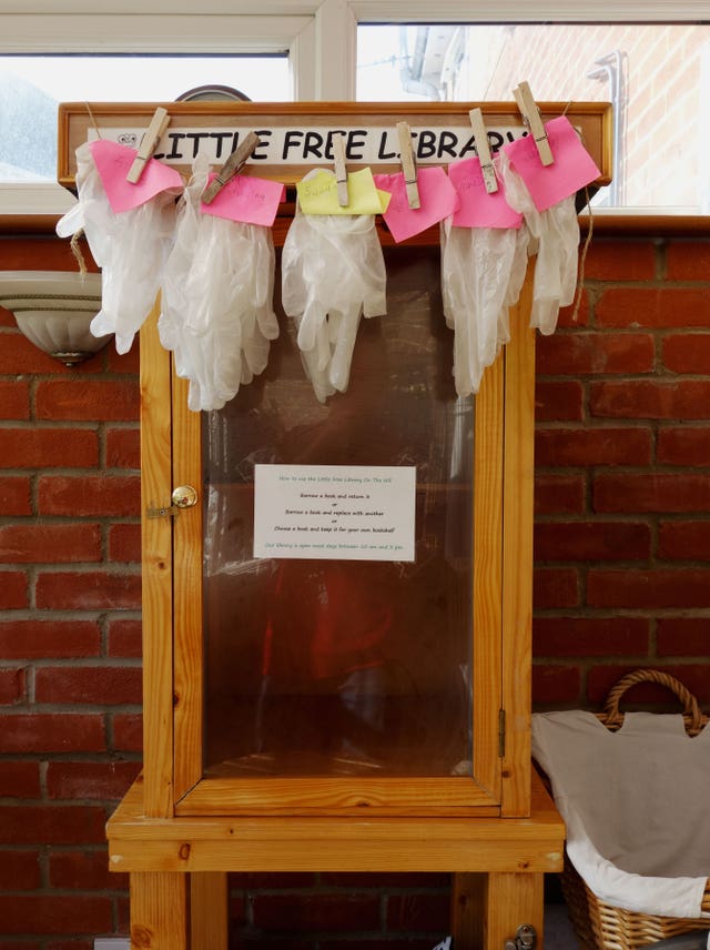 A photo issued by Historic England from its Picturing Lockdown Collection the Little Free Libraryon the Hill, which washes and distributes vinyl gloves, in Norwich, Norfolk, taken by Peter Offord