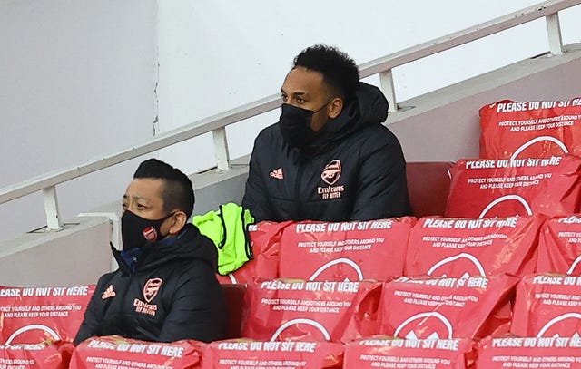 Pierre-Emerick Aubameyang (right) watched on having been dropped (Julian Finney/PA).