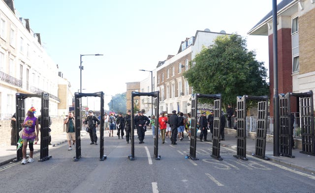 Knife arches at an entrance to the Notting Hill Carnival celebrations in west London