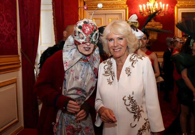 The Duchess of Cornwall posed with Vivienne Westwood at the masquerade charity ball (Chris Jackson/PA)
