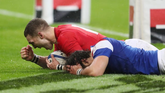 George North celebrates scoring Wales' second try in their fightback against France (David Davies/PA).