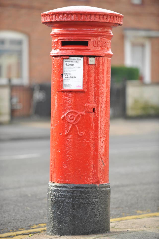 A Royal Mail post box featuring Queen Victoria's cypher 