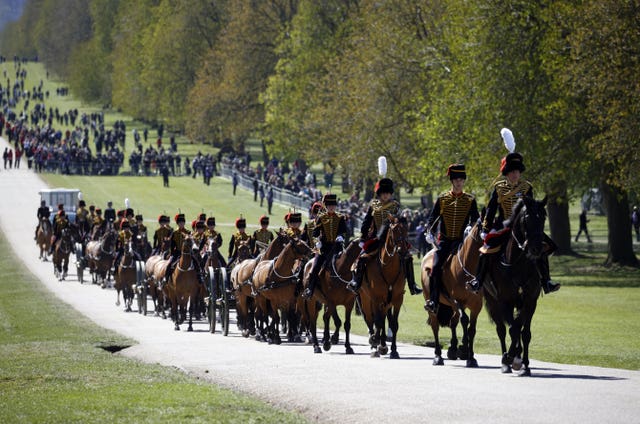 King's Troop Royal Horse Artillery make their way up The Long Walk (Phil Noble/PA)