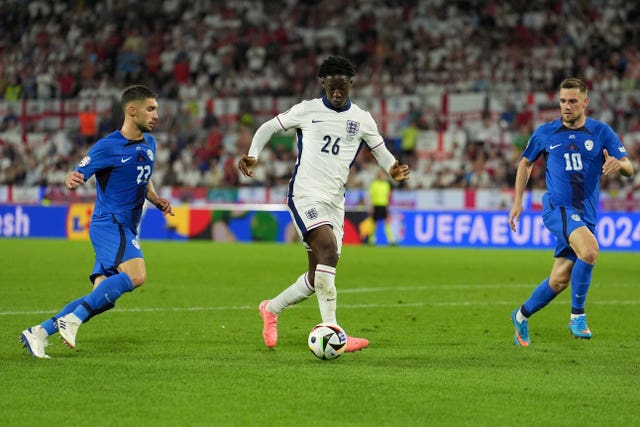 England’s Kobbie Mainoo (centre) in action against Slovenia at Euro 2024