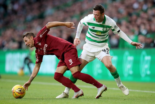 Makeshift left-back Callum McGregor (right) struggled out of position against Cluj