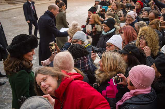 The Duke and Duchess of Cambridge meet members of the public during a walkabout in the streets of Stockholm during the first day of their Swedish tour (Dominic Lipinski/PA)