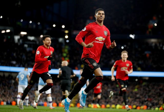 Marcus Rashford celebrates scoring in the Premier League win over Manchester City