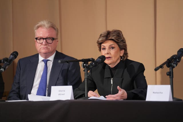 Members of the legal team at a press conference