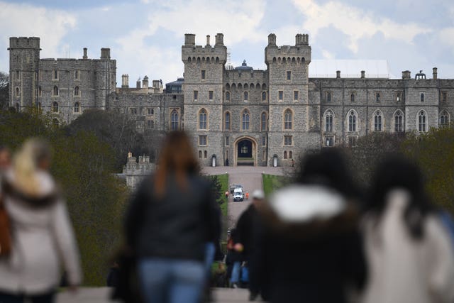 People walk along the Long Walk at Windsor Castle following Philip's death