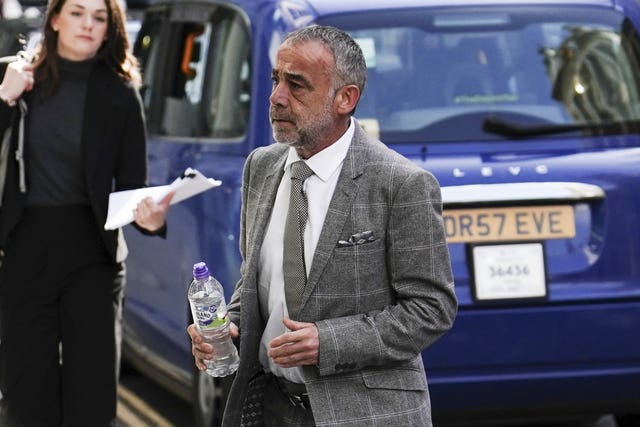 Michael Le Vell arrives at the Rolls Buildings in central London for the phone hacking trial against Mirror Group Newspapers