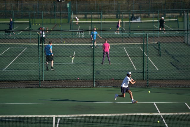 A general view of people playing tennis at Nottingham Tennis Centre