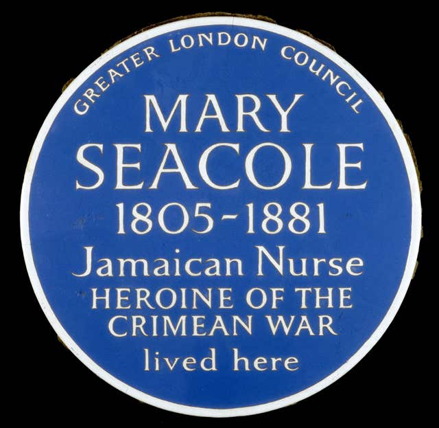 Blue plaque figures