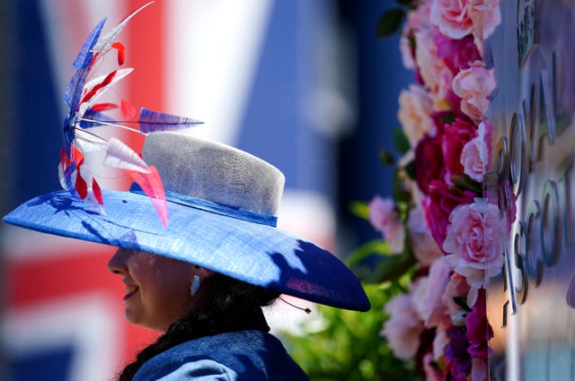 A racegoer in a Union flag hat