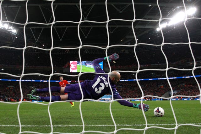 City keeper Willy Caballero saves a penalty from Adam Lallana