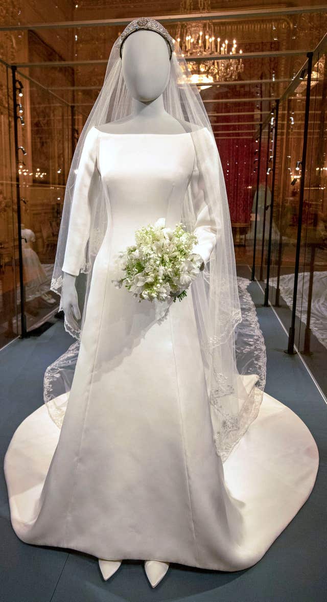 Meghan's wedding gown forms the centrepiece of the Windsor Castle exhibition about the Duke and Duchess of Sussex's wedding.Steve Parsons/PA Wire