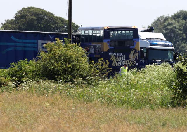 The bus driver and a passenger were killed in the crash on Tuesday morning (Chris Radburn/PA)