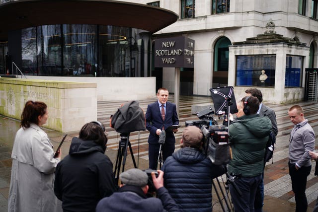 Metropolitan Police Detective Superintendent Lewis Basford speaking to the media outside Scotland Yard