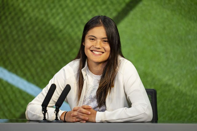 Emma Raducanu smiles during a press conference
