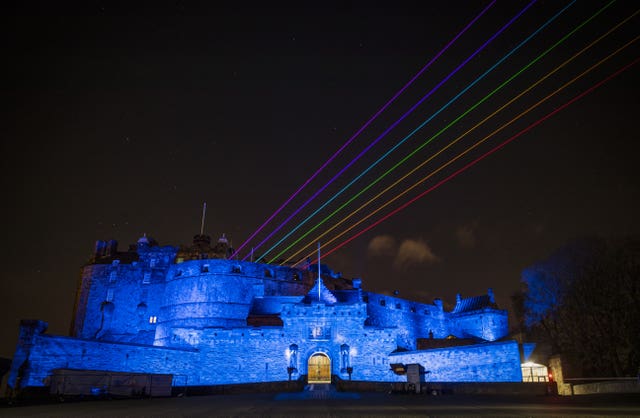 A rainbow lights up the sky above Edinburgh Castle
