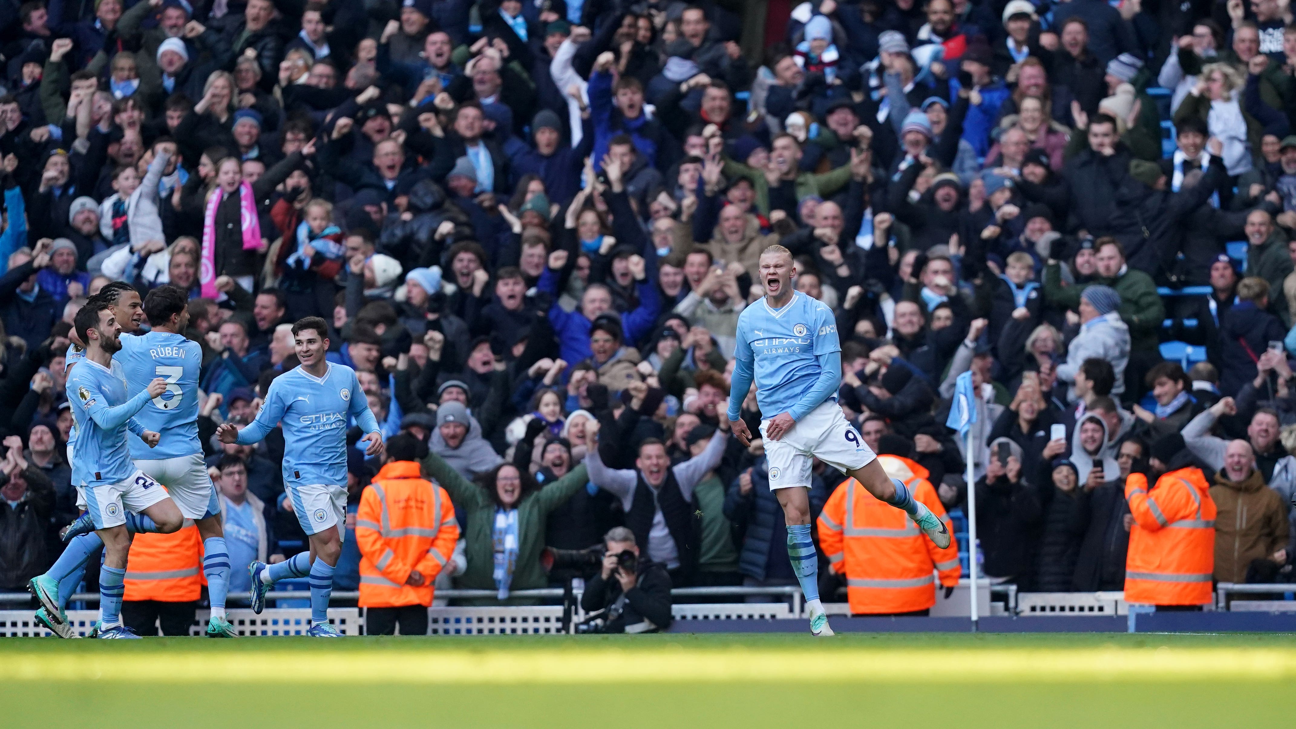 Manchester City’s Erling Haaland celebrates scoring the opening goal (Martin Rickett/PA)