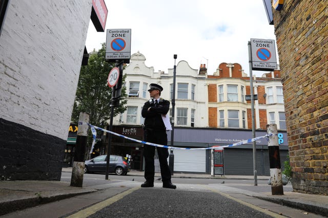 Police at the scene at Askew Road, Shepherd’s Bus